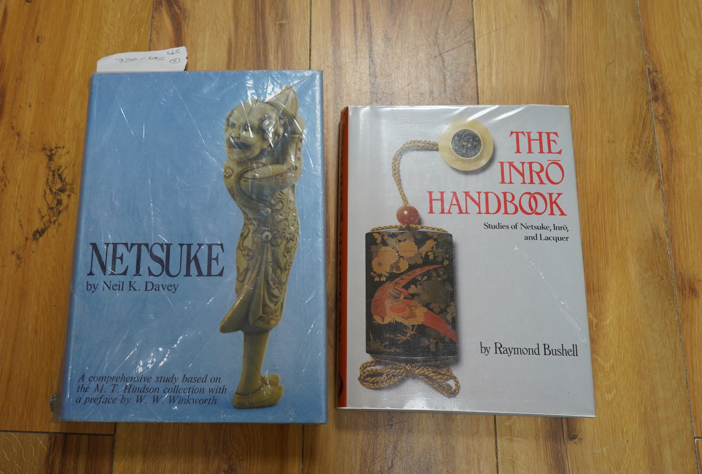 A group of reference books relating to netsuke and inro